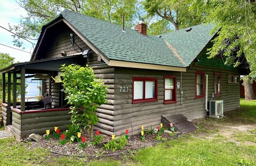 Polson Cabin | Charming rustic cabin with shared lake access and golf course views.