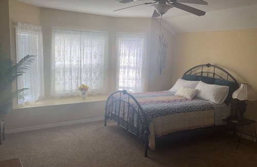 Riverview House | Charming spacious bedroom and private bath. No kitchen access