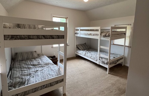 Bellaire Cottage | Charming Stone Cottage in Downtown Bellaire