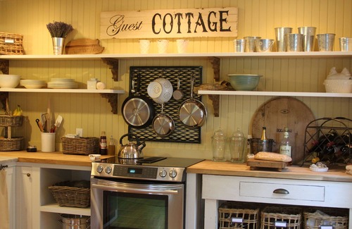 Paonia Cottage | Charming studio cottage on quiet street with beautiful landscaping and gardens.