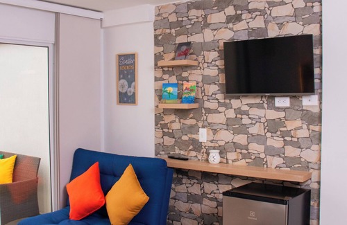 San Gil Apartment | Charming studio in San Gil. Swimming pool, sauna, turco, terrace and free WiFi