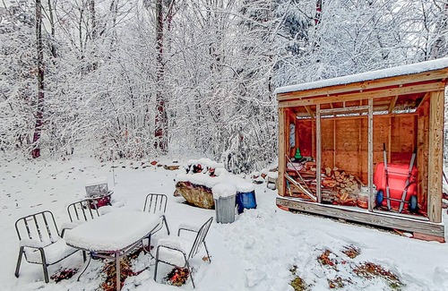 Alton Bay House | Charming & sun-filled nature escape with large deck, wood stove, fire pit, & W/D
