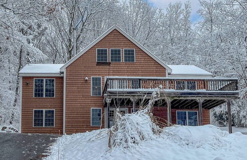 Alton Bay House | Charming & sun-filled nature escape with large deck, wood stove, fire pit, & W/D