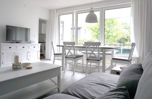 Langeoog Apartment | Charming vacation apartment with maritime flair, ground floor, 3 rooms, approx. 63m², SW, W-balcony