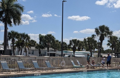 Fort Myers Beach Cottage | Charming vintage beach trailer w/ resort amenities, just outside Sanibel Island!