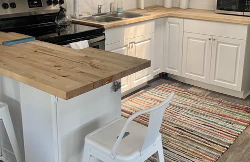 Fort Myers Beach Cottage | Charming vintage beach trailer w/ resort amenities, just outside Sanibel Island!