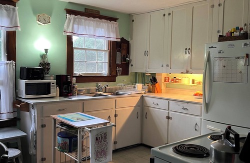 Pawcatuck House | Charming waterfront 1920s Craftsman-style home on 4+ private acres