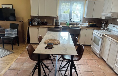 Ottawa Division House | Cheerful 4 bedroom house with large deck and garden in walkable neighbourhood.