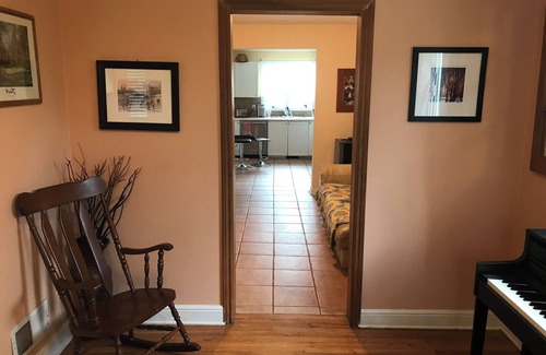 Ottawa Division House | Cheerful 4 bedroom house with large deck and garden in walkable neighbourhood.