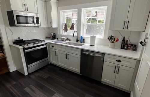Framingham House | Cheerful entire house with 3 bedrooms and work area.