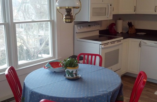 Commercial Street Condo | Cheerful, renovated condo with private beach and parking