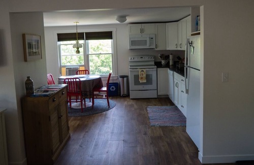 Commercial Street Condo | Cheerful, renovated condo with private beach and parking
