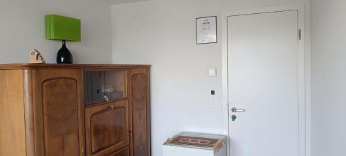 Courtepin House | Chez Elsa et Agou - chambre confortable chez l'habitant