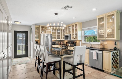 Holmes Beach Condo | Chic 2BR Waterfront Condo | Pool & Views