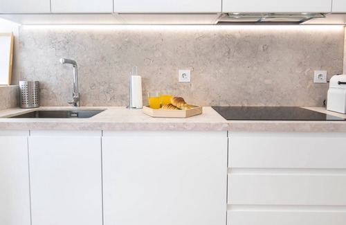 Bairro Alto Apartment | Chic, Citrus Home with a Private Garden by LovelyStay