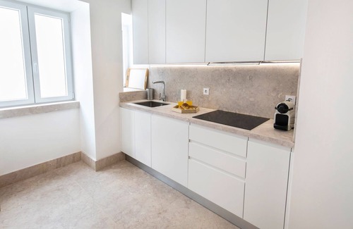 Bairro Alto Apartment | Chic, Citrus Home with a Private Garden by LovelyStay