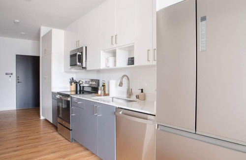 Yankee Hill Apartment | Chic East Side 1BR Apt with Balcony, Pool, and Gym