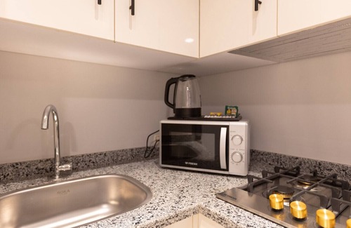 New Cairo Apartment | Chic Navy Nest 2BR | Comfort & Style in Lotus | Travelholic Stay