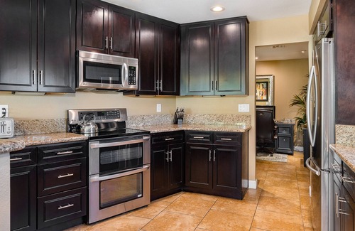 Paradise Villa | Chic Poolside Retreat: 20K Recent Reno, Stunning Hardscape, Pet-Friendly Vibes