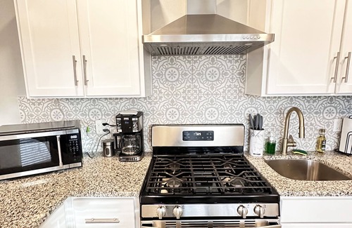 Pershing - Government Hill House | Chic Tiny Brick Home: Remodeled Unit 1n