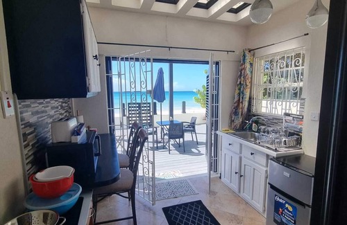 Oistins Apartment | Chill a Bit Beach Apartment, Beachside Bliss! Apartment and Deck On the Beach!