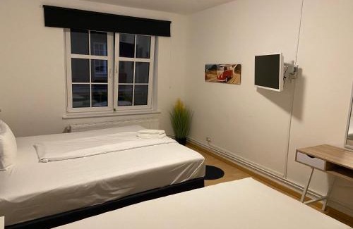 Neumuenster Apartment | City Apartments direkt am Hauptbahnhof - Perfekt für Pendler und Monteure