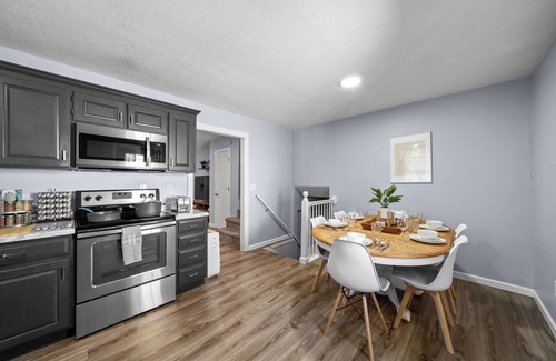 Spring Hill House | Clean, spacious, and fully renovated townhouse with modern charm and comfort.