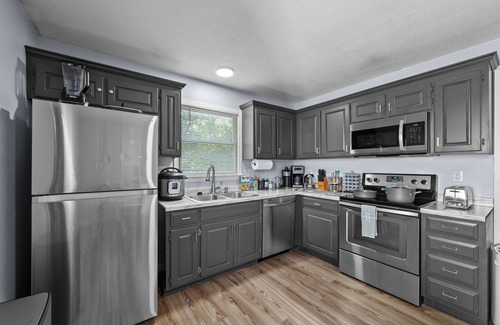 Spring Hill House | Clean, spacious, and fully renovated townhouse with modern charm and comfort.