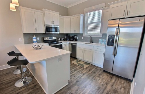 Gulf Shores House | Coastal Breeze Cottage ~ Heated & Cooled Pool + $400 in FREE Activities Daily ~ Zoo, Parasailing