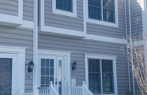 North Ocean City House | Coastal chic waterfront townhouse w/bayside sunsets.