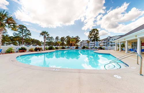 Calabash Apartment | Coastal Condo with golf on-site, shared pool and fitness center