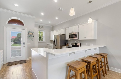 Sunset Pass House | Coastal Living Perfected: Banana Bay's Intracoastal Retreat with Sandy Shores