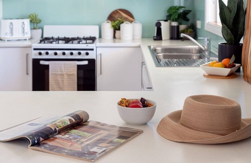 Culburra Beach House | Coastal Palms – your sun-soaked coastal getaway