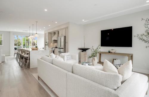 Beach Barber Tract House | Coastal retreat near the beach w Panoramic Ocean Views, Rooftop Deck, & Firepit