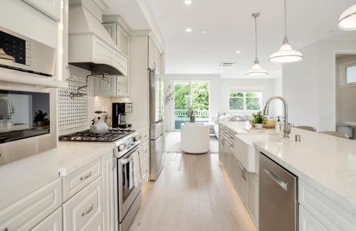 Beach Barber Tract House | Coastal retreat near the beach w Panoramic Ocean Views, Rooftop Deck, & Firepit