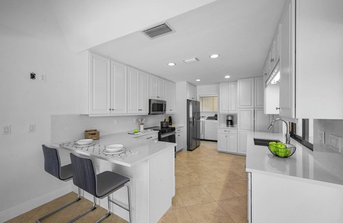 Marco Island House | Coastal Waterfront Home | Pool Spa and Dock