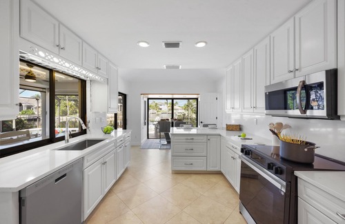 Marco Island House | Coastal Waterfront Home | Pool Spa and Dock