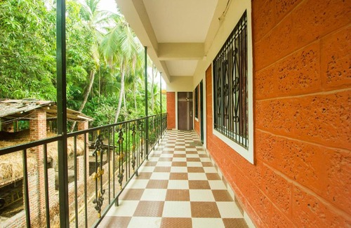 Nagaon Hotel | Collection O Raghusheela Cottage