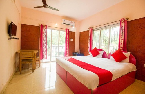 Nagaon Hotel | Collection O Raghusheela Cottage