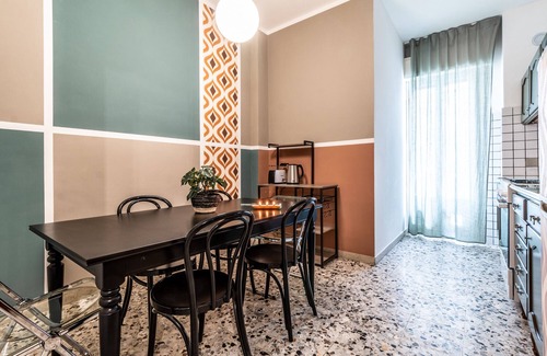 Historic Center Apartment | Colorful apartment in Riva di Reno by Wonderful Italy