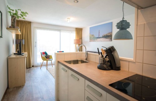 Hollum Apartment | Comfortable apartment close to amenities, pool, beach, forest and dunes.