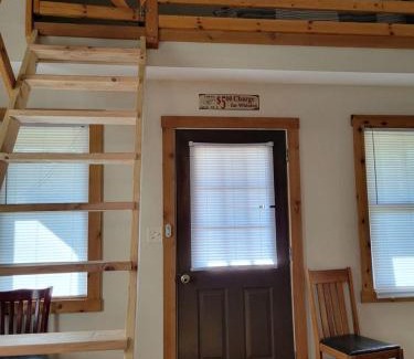 Moscow House | Comfortable Camping Cabins with View of the Cedar River for a Family Weekend Getaway