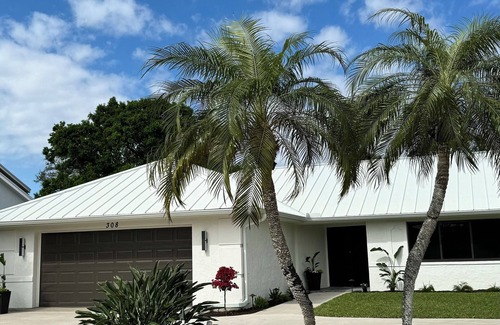 Palm River Estates House | Completely renovated 3-bedroom, heated pool home, privacy, near Naples beach!