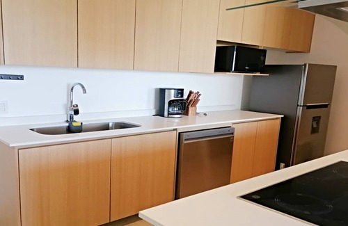 Flamingos Condo | Condo Aria Ocean 501 by Kivoya