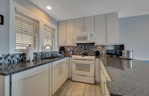 Boyne City Condo | Condo with Lake Charlevoix Views | Private Beach Access | Gas-Log Fireplace