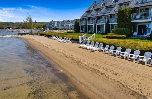 Boyne City Condo | Condo with Lake Charlevoix Views | Private Beach Access | Gas-Log Fireplace