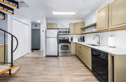 Alyeska Condo | Condo with lanai, mountain view, fireplace, & spiral staircase
