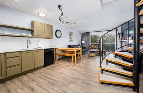 Alyeska Condo | Condo with lanai, mountain view, fireplace, & spiral staircase