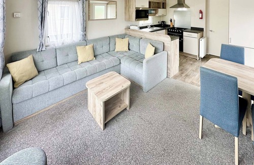 Cross Inn House | Contemporary 12ft-wide caravan with one double and one twin.