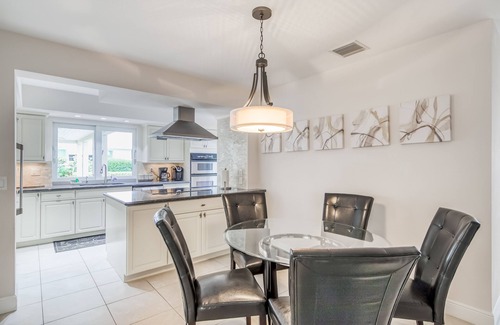 Singer Island House | Contemporary Canal-Front Home with Private Pool & Spa, Free WiFi & Private W/D